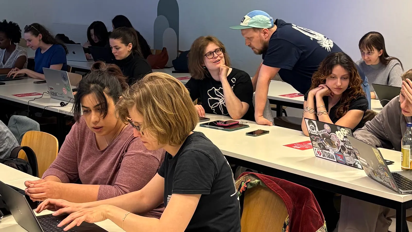 Participants and a JetBrains workshop leader at the BLISS x JetBrains workshop on AI agents