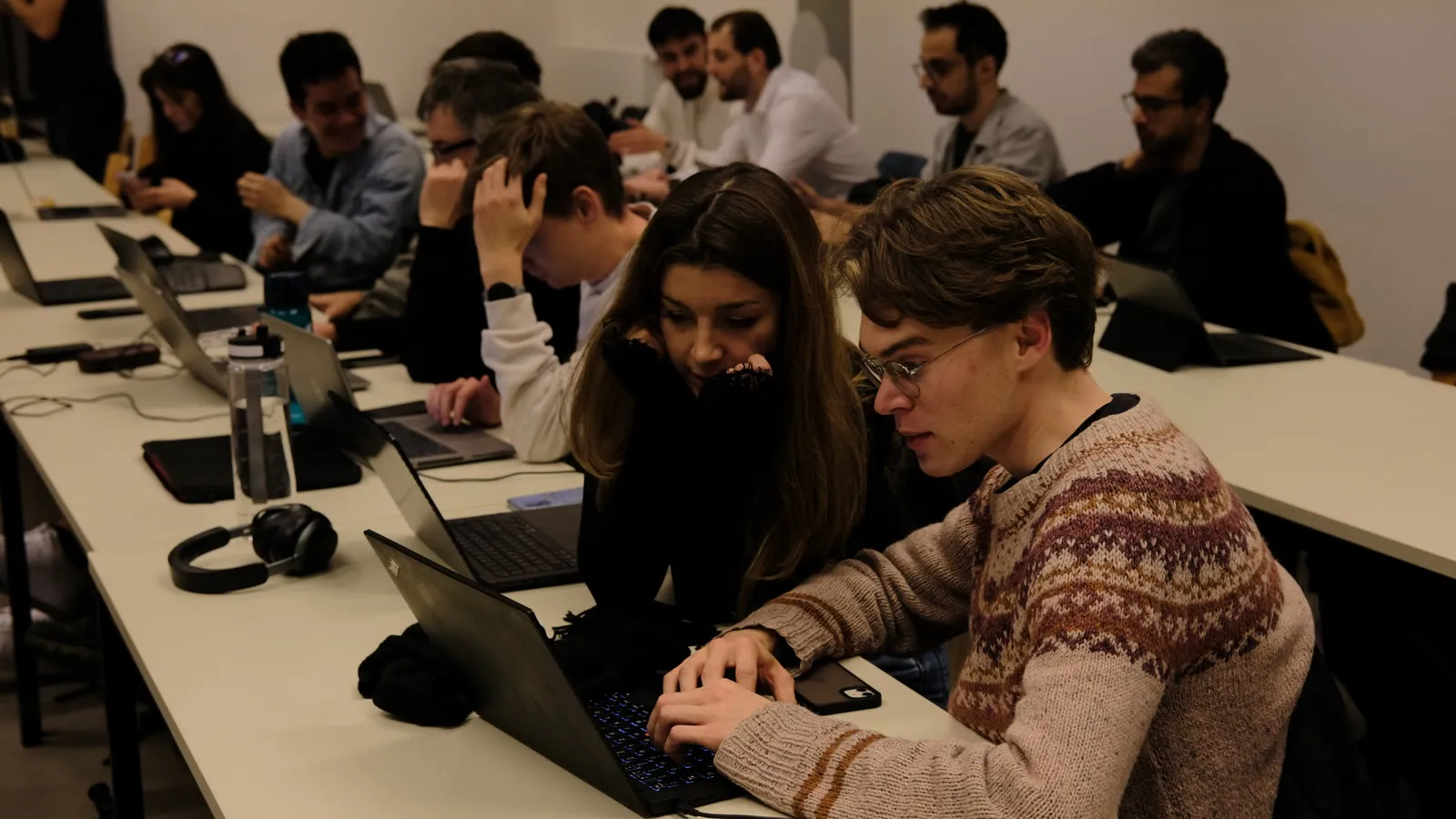 Participants coding at the BLISS x InstaDeep workshop on foundation models for genomics