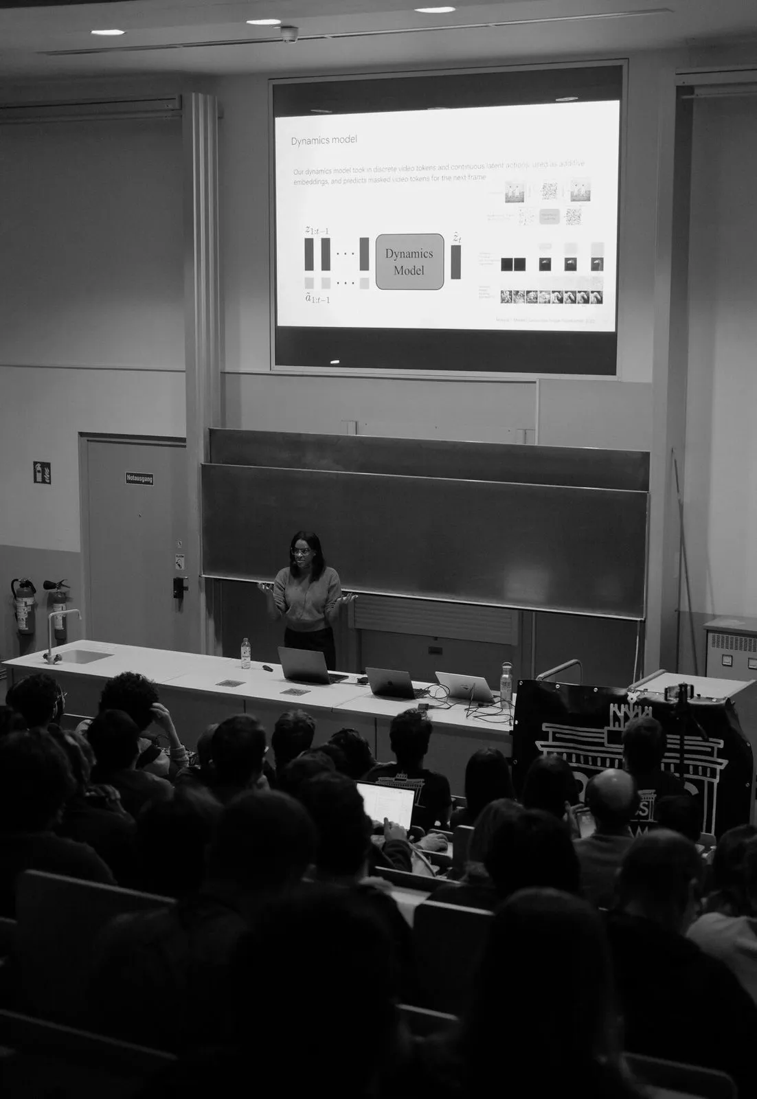 Ashley Edwards (Google DeepMind) during her talk on generative world models